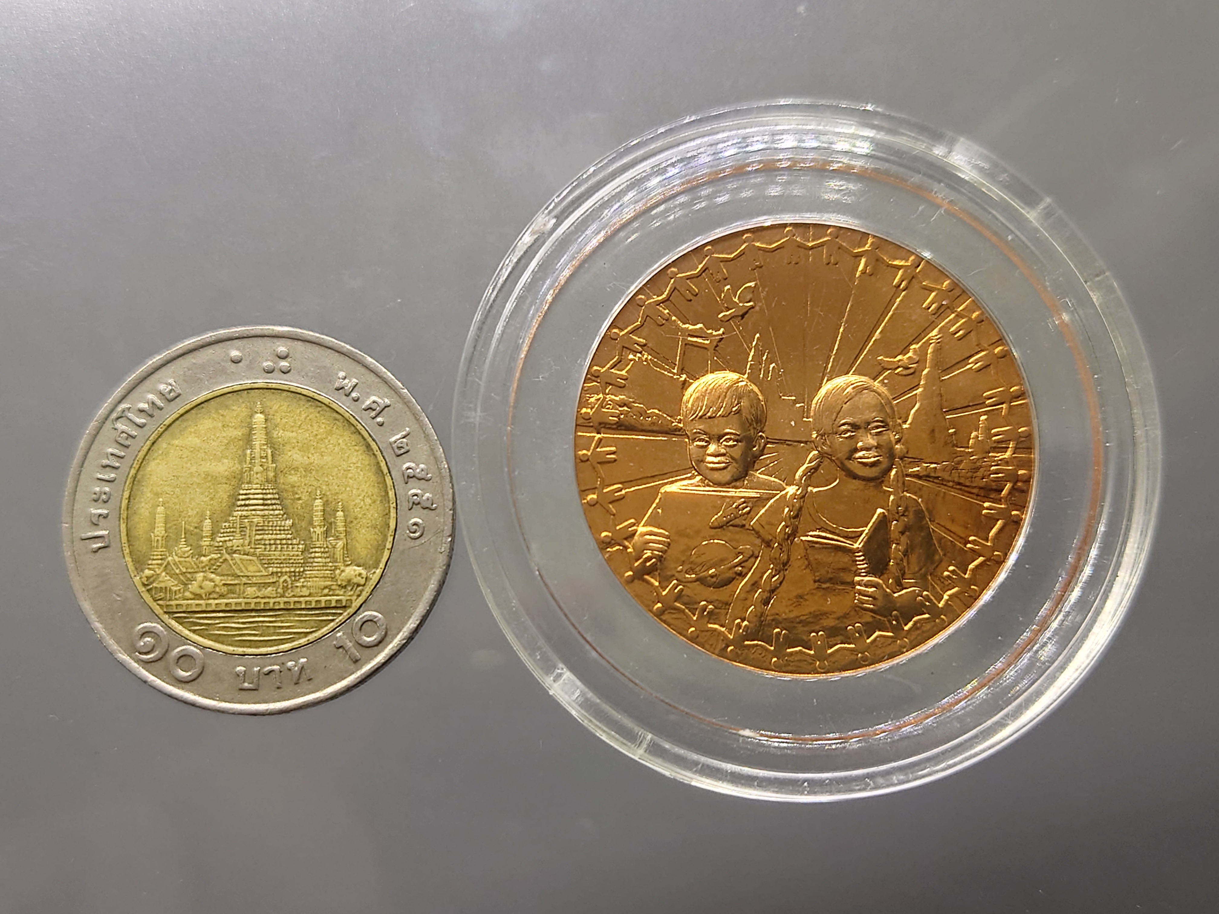 เหรียญวันเด็กแห่งชาติ ประจำปี พ.ศ.2558 เนื้อทองแดง ไม่ผ่านใช้