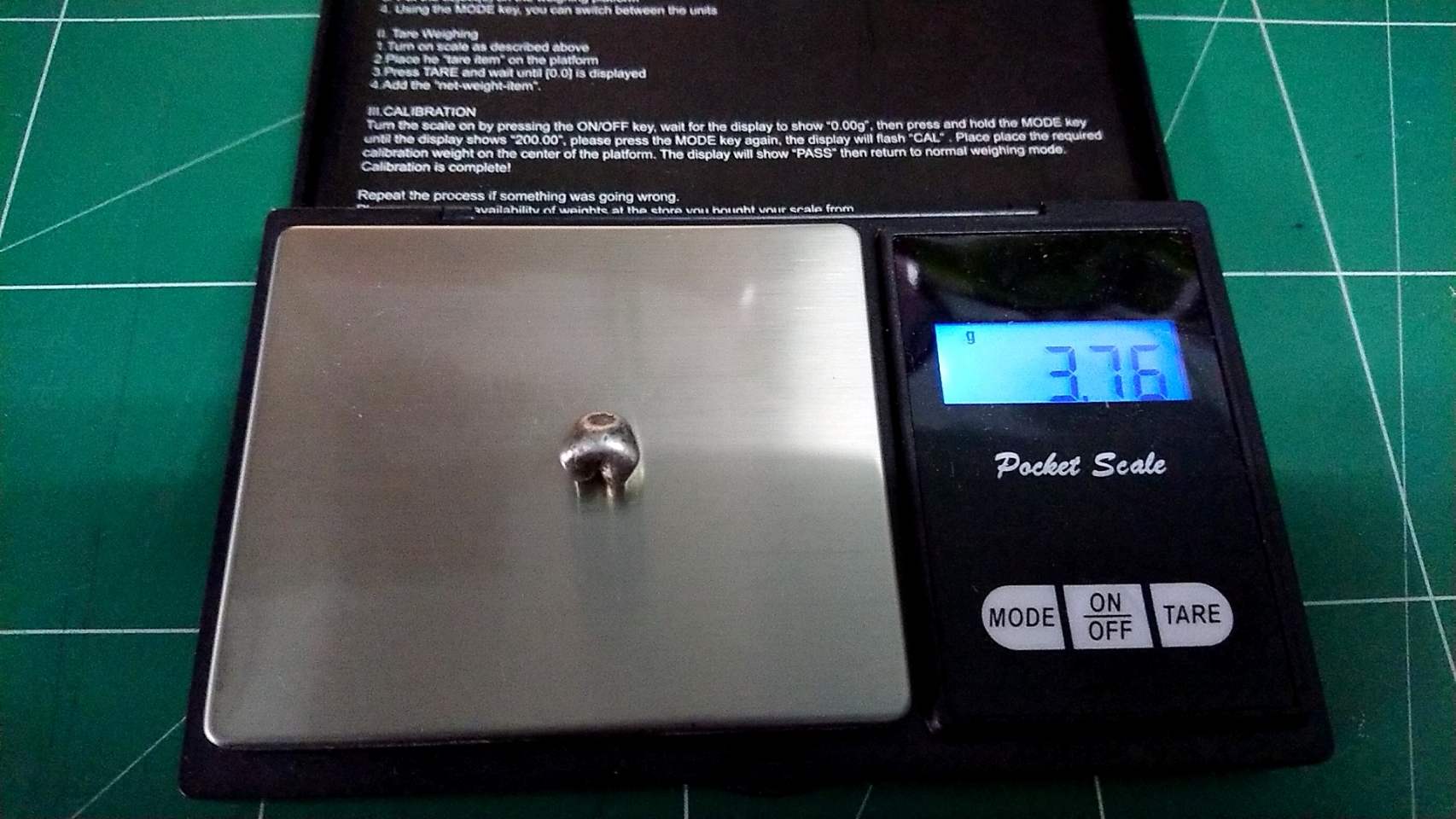 พดด้วง ขนาดสลึง ตราพระแสงจักร-หัวลูกศร พ.ศ.2391