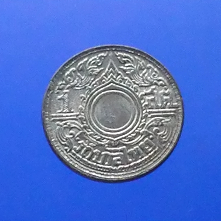 เหรียญ 1 สตางค์ ดีบุก ไม่มีรู 2487 (เลข 1 อารบิค) ไม่ผ่านใช้