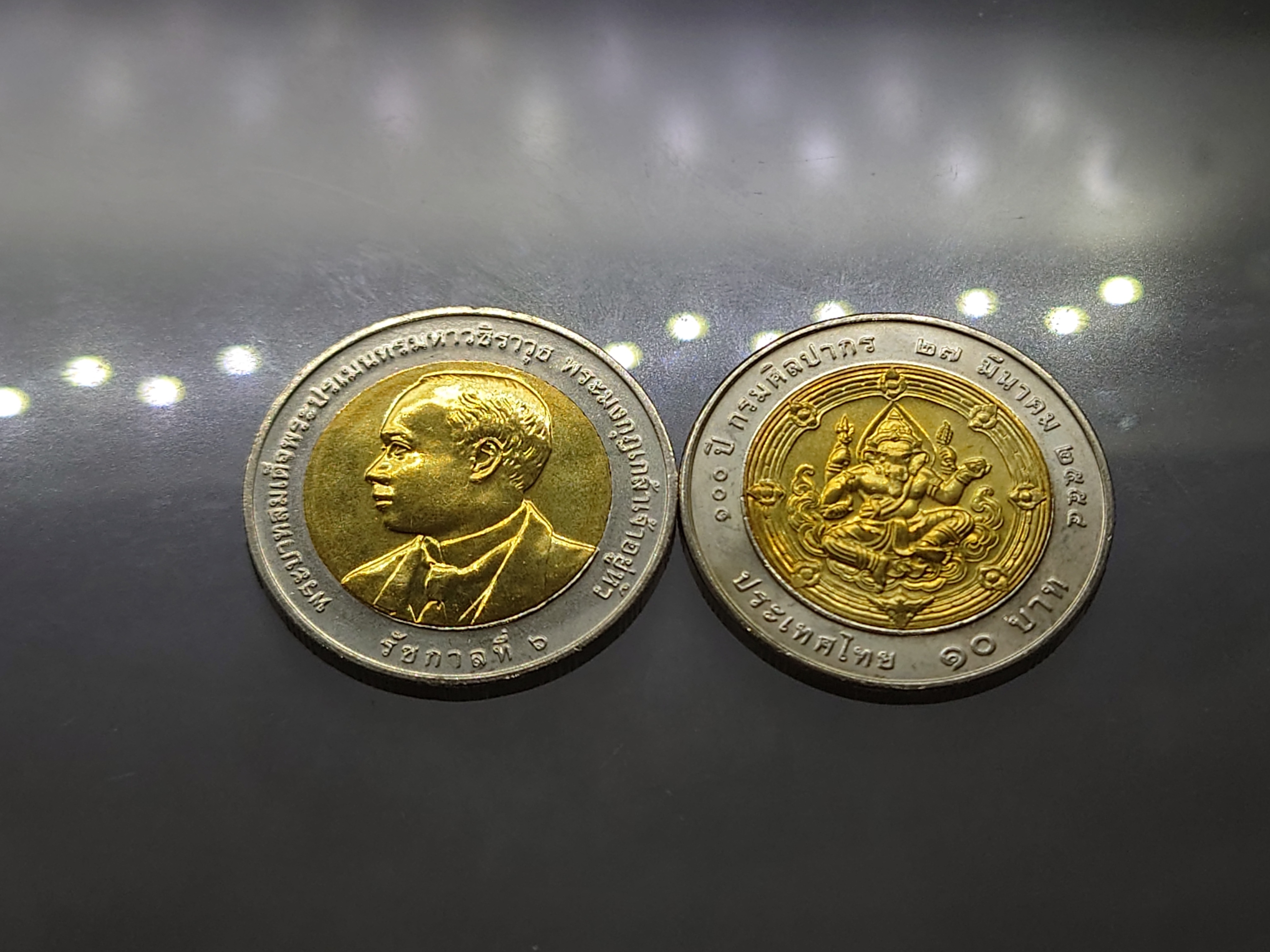 เหรียญ 10 บาท สองสี ที่ระลึก 100 ปี กรมศิลปากร พระรูป รัชกาลที่6 หลังพระพิฆเนศ ปี2554 ไม่ผ่านใช้