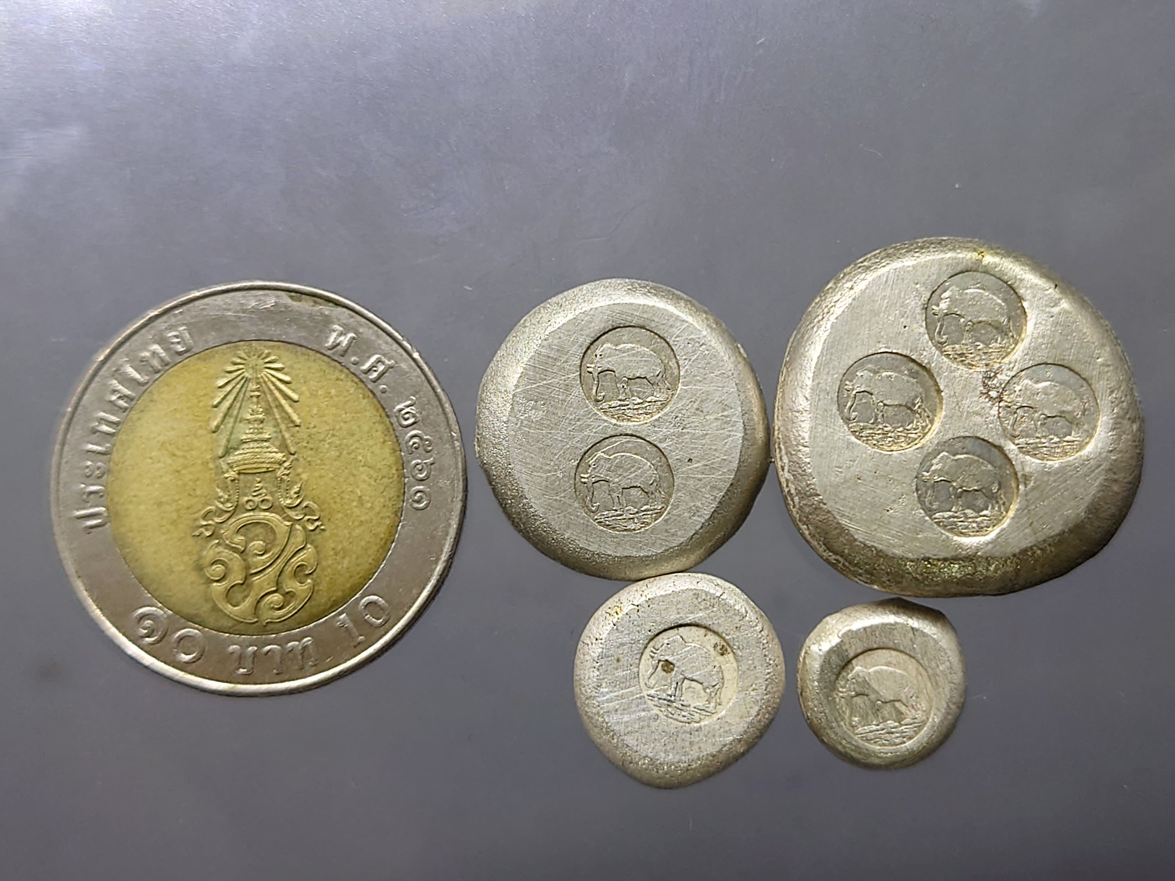 เงินก้อนชุด 4 ขนาด (ขนาดบาท สองสลึง สลึง เฟื้อง) ตอกตราการค้าช้างสยาม ตราหายาก เงินโบราณ หายาก สภาพสวย