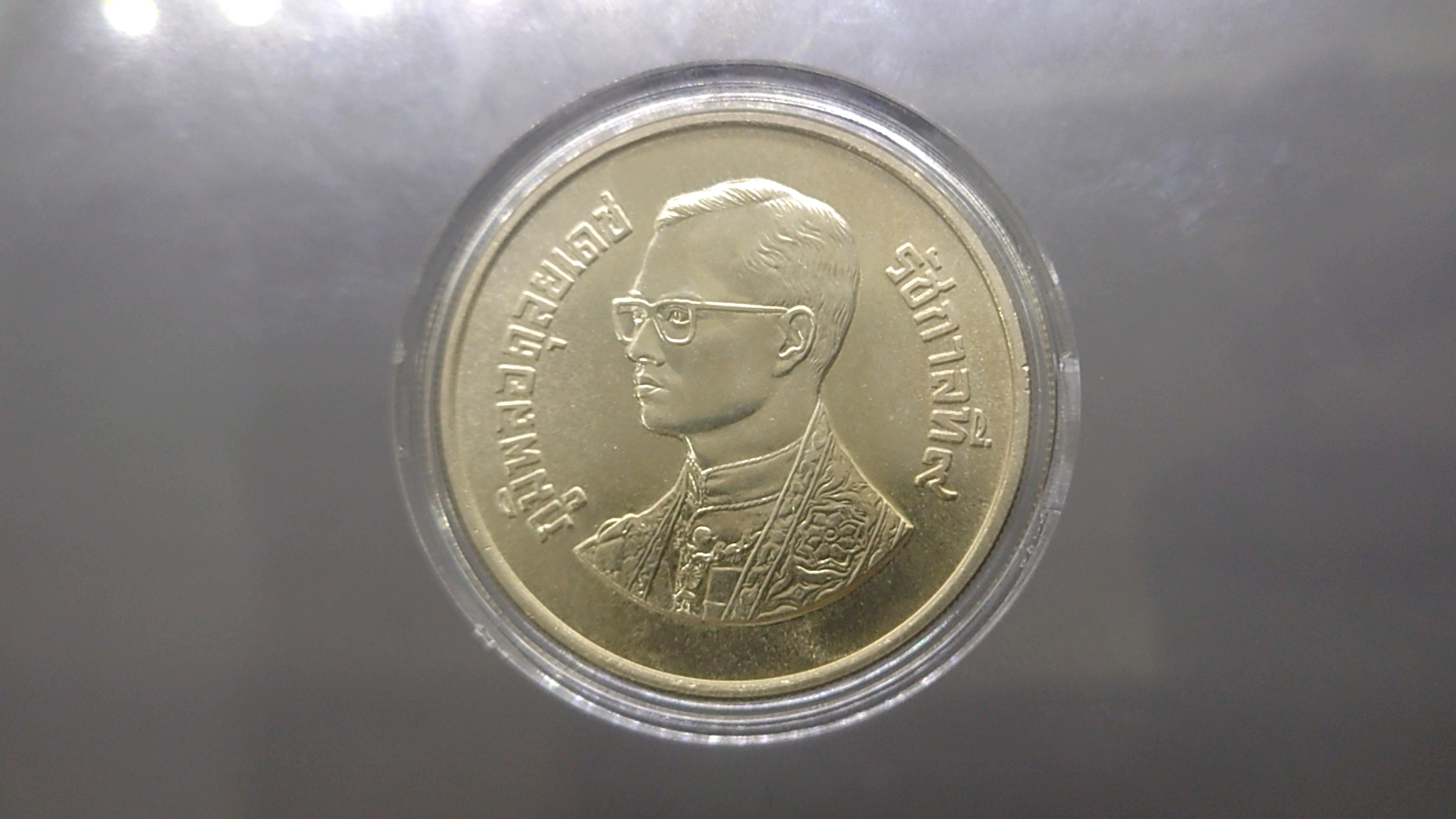 เหรียญ 600 บาท เนื้อเงิน ที่ระลึกงานกล้วยไม้อาเซียน ครั้งที่ 6 ปี 2529