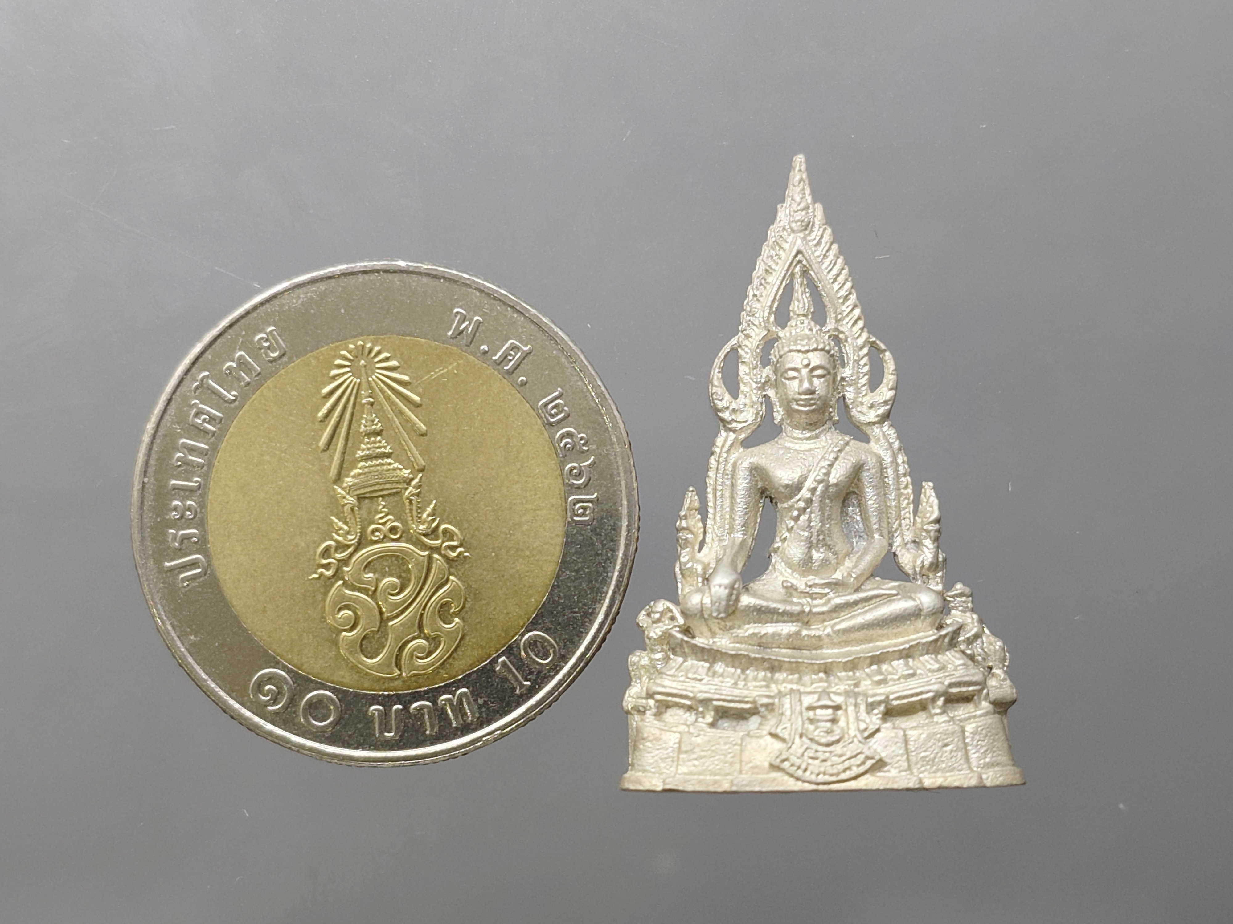 กริ่งพระพุทธชินราช รุ่นทรงมาลาเบี่ยง รุ่นแรก รุ่นเดียว เนื้อเงิน วัดพระศรีรัตนมหาธาตุ พิษณุโลก ปี2520 นิยม หายาก พร้อมตลับเดิม