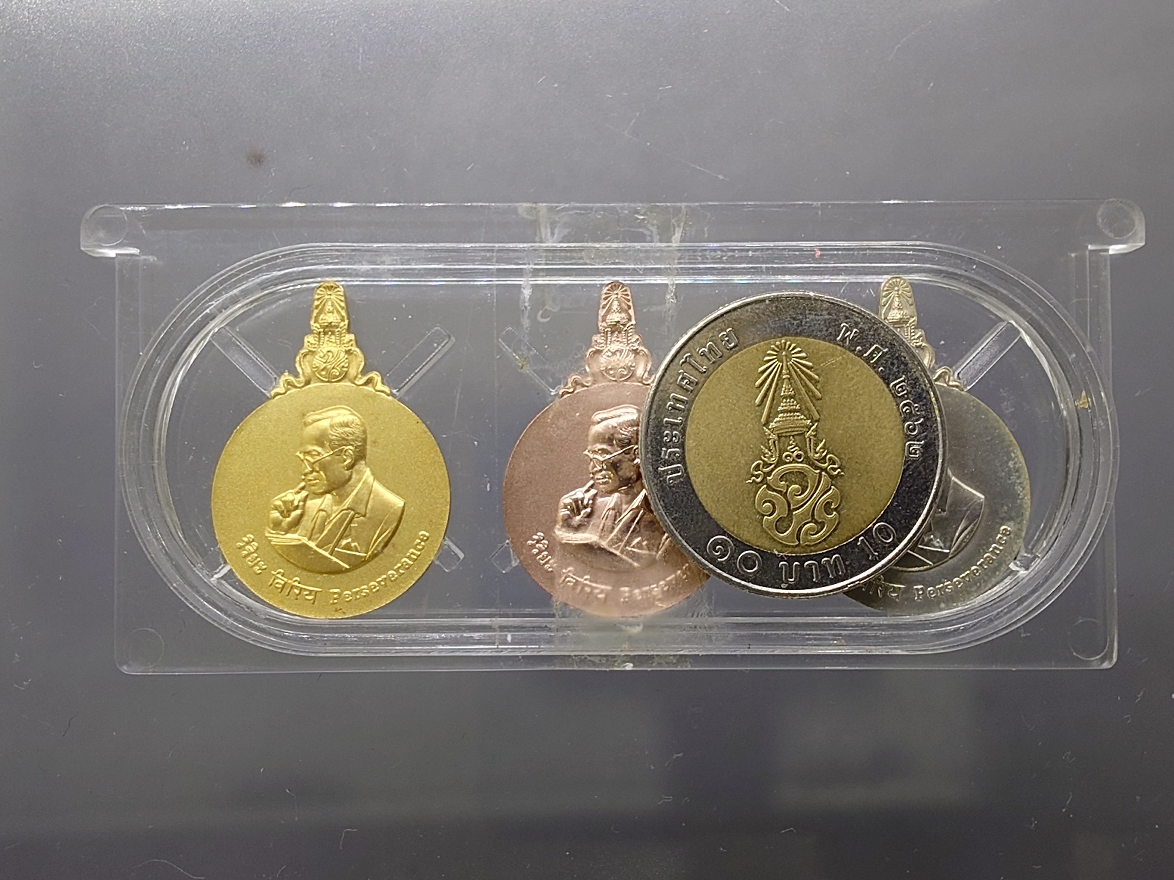 เหรียญพระมหาชนก (วิริยะ) รัชกาลที่9 ครบชุดทองคำ พิมพ์เล็ก (เนื้อทองคำ เนื้อนาค เนื้อเงิน) ปี2542 พร้อมหนังสือ